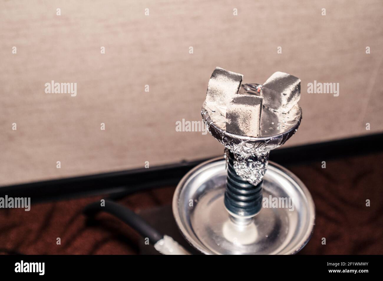 coals on hookah foil home chill relax smoking activity flat Stock Photo Alamy