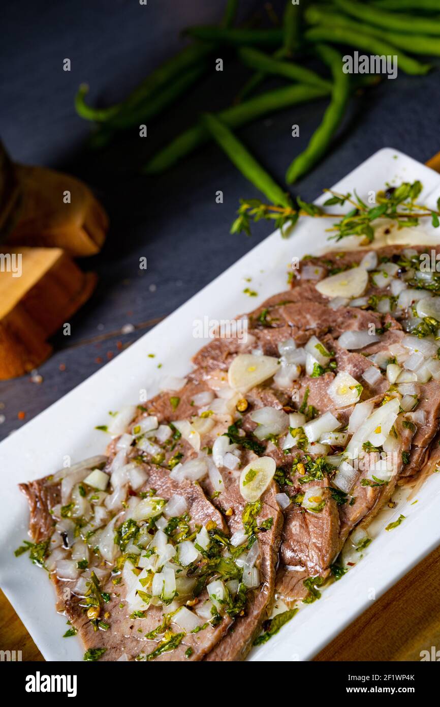Cold Rear Beef With Delicious cold beef with vinaigrette Stock Photo - Alamy