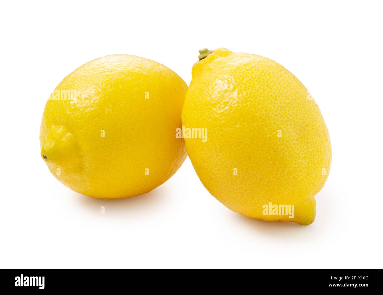 Two lemons placed on a white background Stock Photo