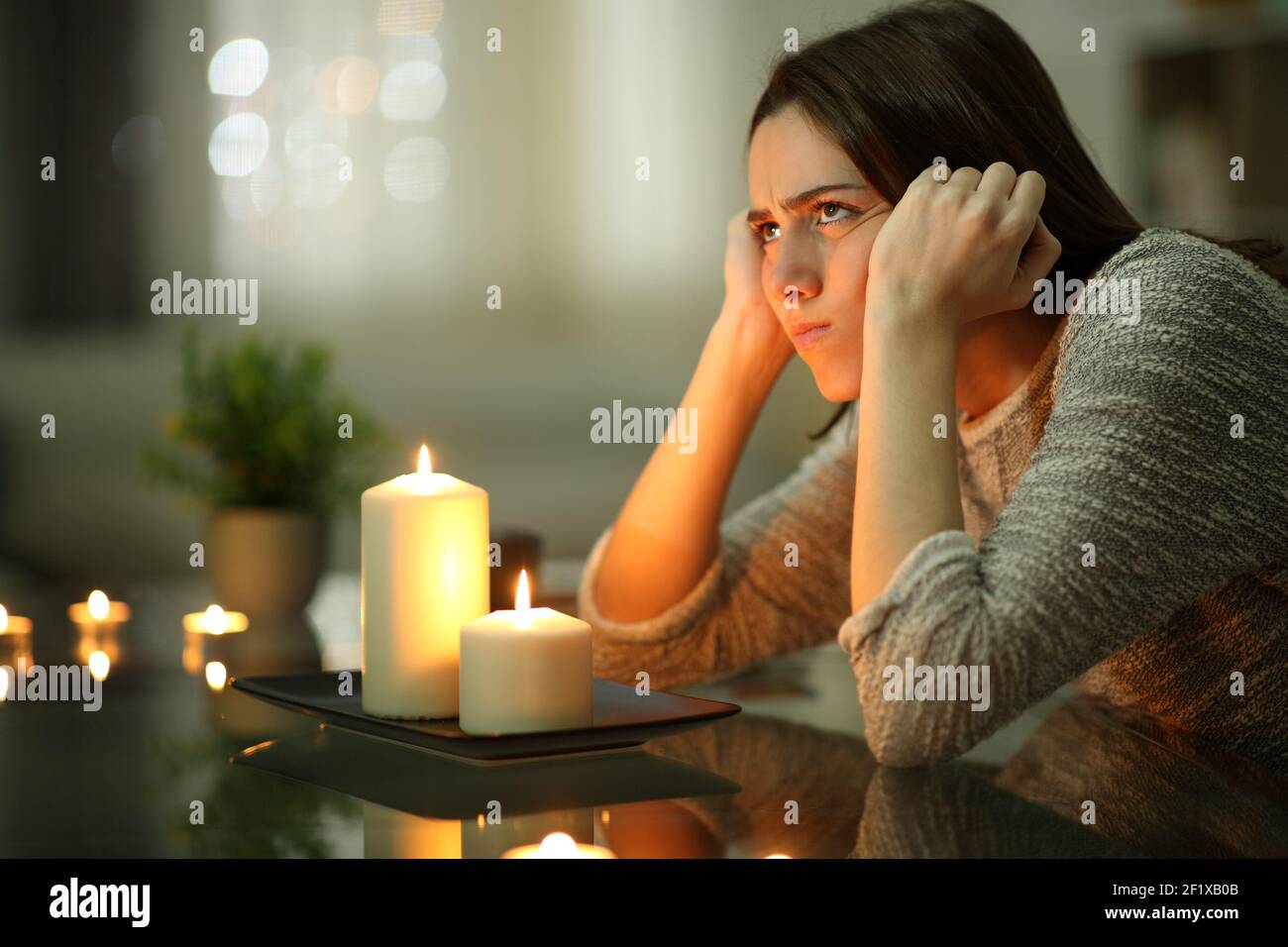 Man Holding Burning Match While Lighting Candles In Dark Kitchen During Power  Outage Stock Photo, Picture and Royalty Free Image. Image 194083174.