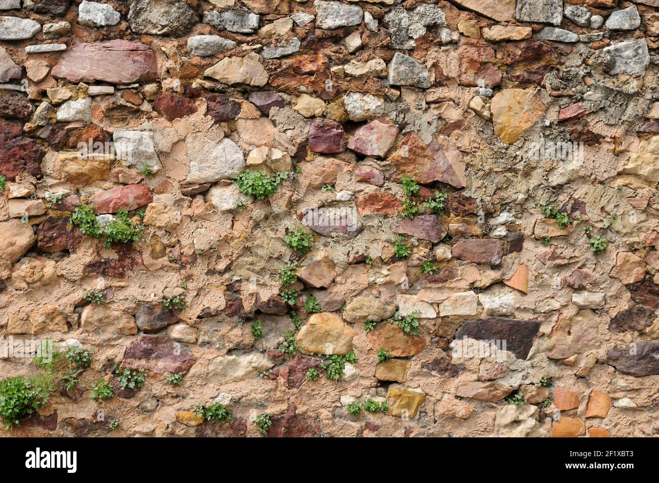 Orche Rocks Image Colorful stone wall made with ochre rocks, Roussillon, Vaucluse ...