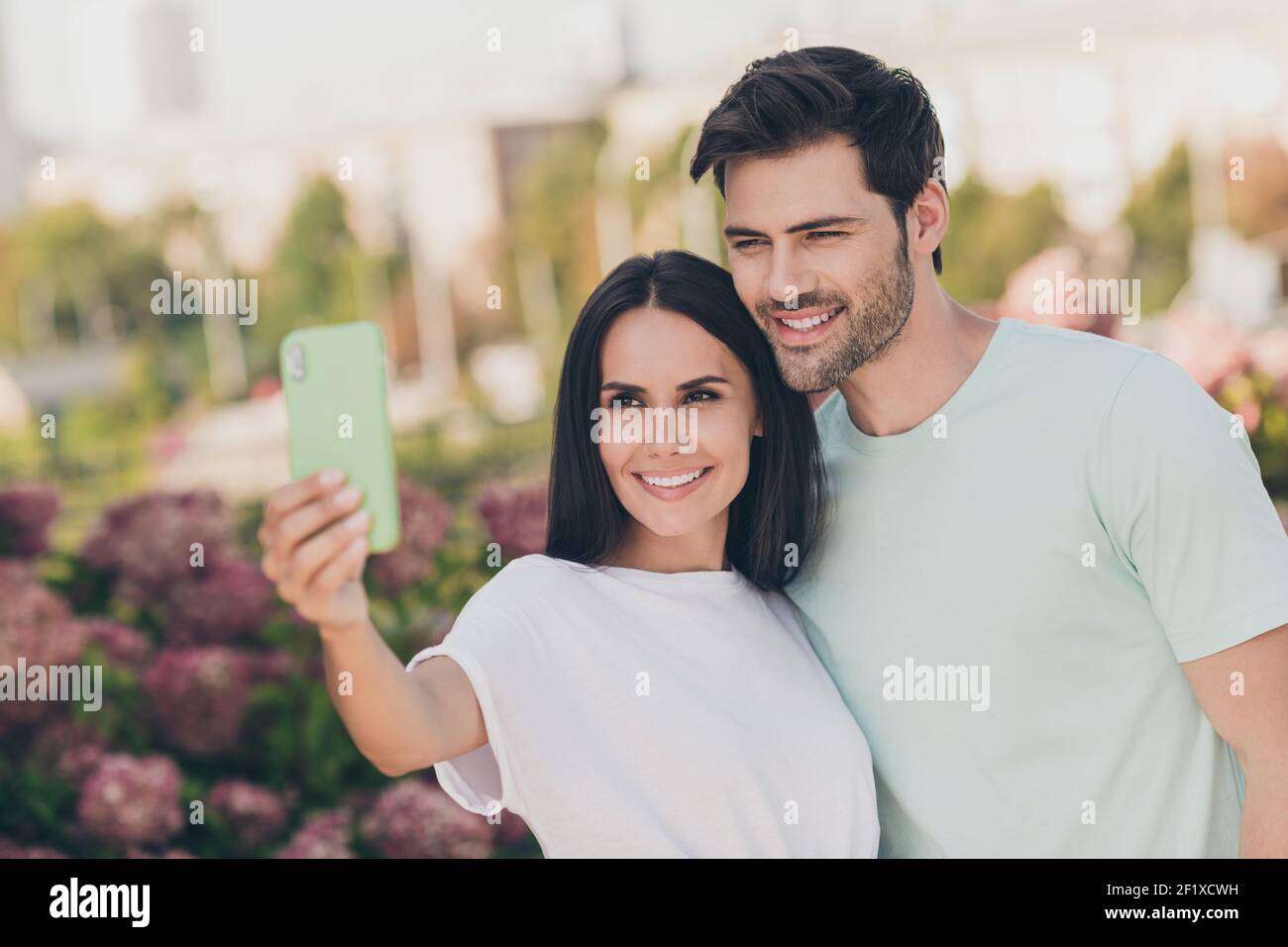Happy young couple, Pose For selfie pose with smart phone, making selfie on  camera. Stock Photo | Adobe Stock