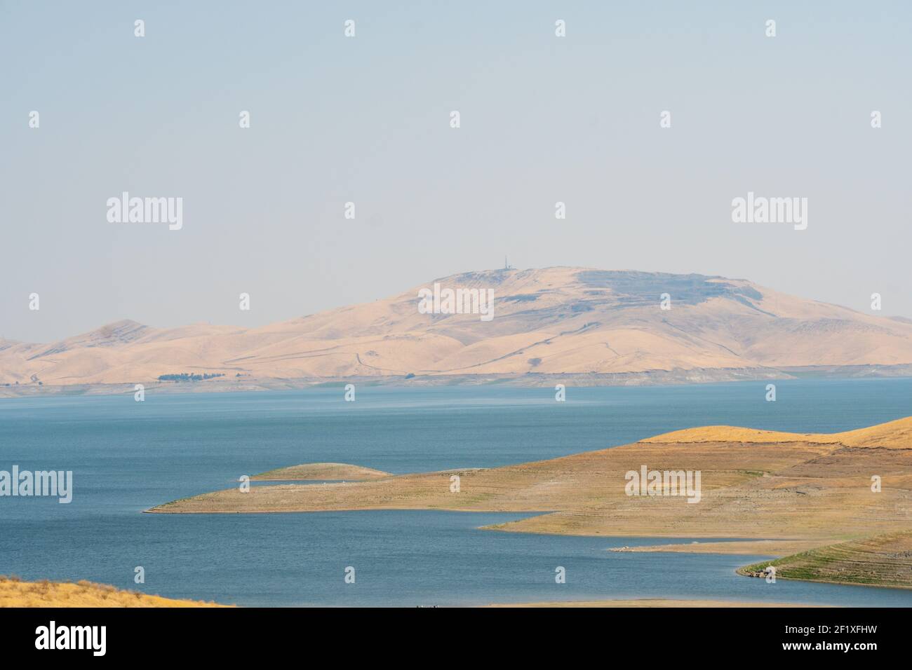 The San Luis Reservoir during dry and hot season, California, USA Stock Photo