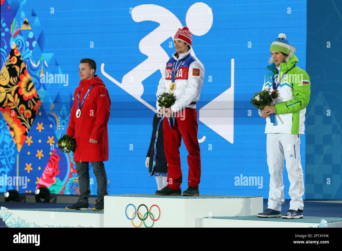 Snowboard Mens' Parallel Giant Slalom Podium, Nevi Galmarini from Switzerland, silver medal, Vic Wild from Russia , gold medal and Zan Kosir from Slovenia, bronze medal, at the place medals during the XXII Winter Olympic Games Sotchi 2014, day 12, on February 19, 2014 in Sochi, Russia. Photo Pool KMSP / DPPI Stock Photo