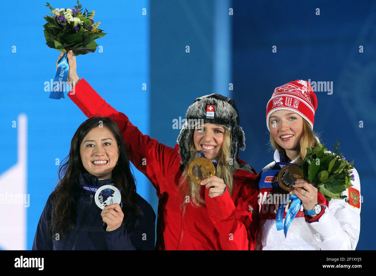 Snowboard Ladies' Parallel Giant Slalom Podium, Tomoka Takeuchi from Japan, silver medal, Patrizia Kummer from Switzerland, gold medal and Alena Zavarzina from Russia, bronze medal, at the place medals during the XXII Winter Olympic Games Sotchi 2014, day 12, on February 19, 2014 in Sochi, Russia. Photo Pool KMSP / DPPI Stock Photo