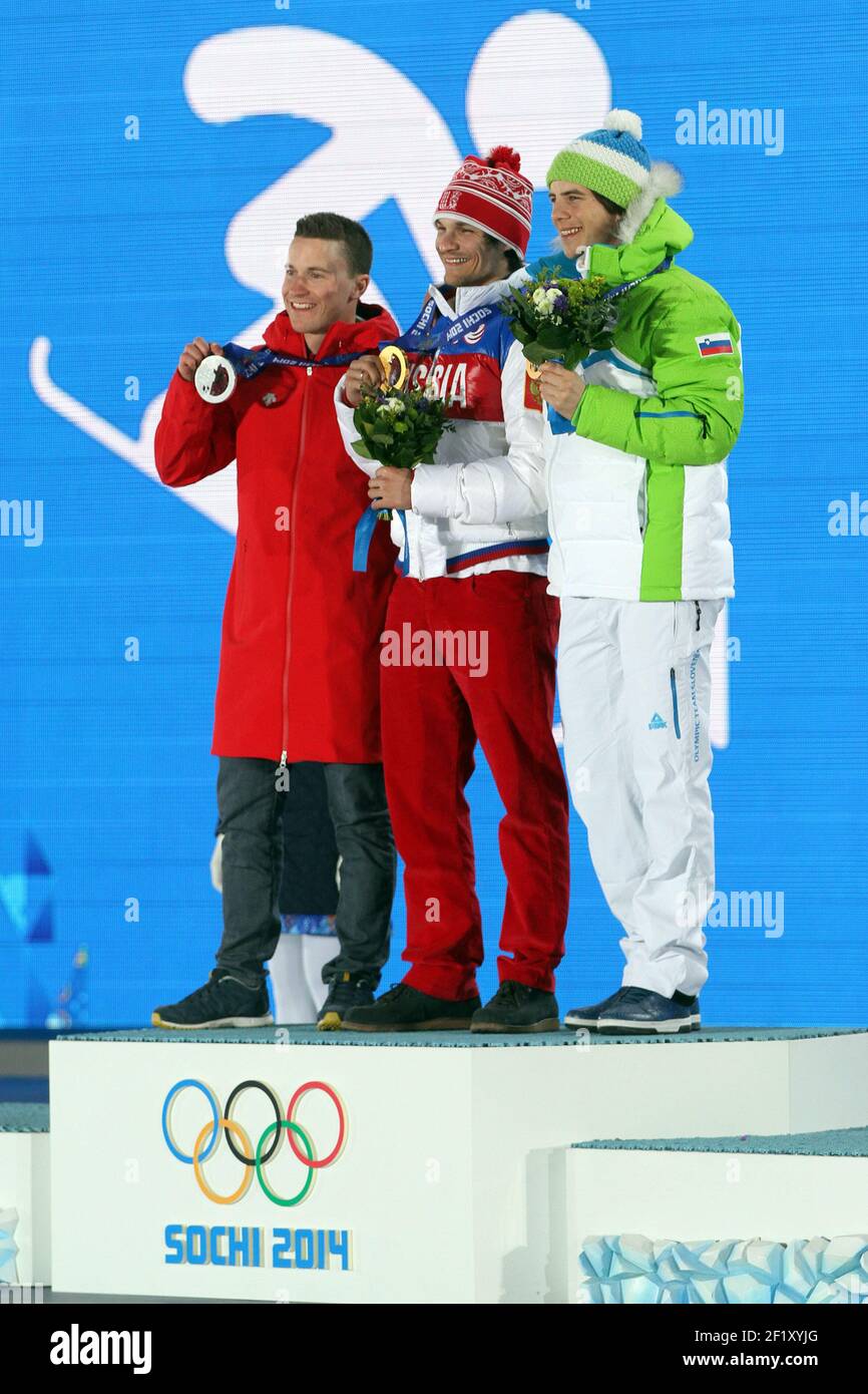 Snowboard Mens' Parallel Giant Slalom Podium, Nevi Galmarini from Switzerland, silver medal, Vic Wild from Russia , gold medal and Zan Kosir from Slovenia, bronze medal, at the place medals during the XXII Winter Olympic Games Sotchi 2014, day 12, on February 19, 2014 in Sochi, Russia. Photo Pool KMSP / DPPI Stock Photo