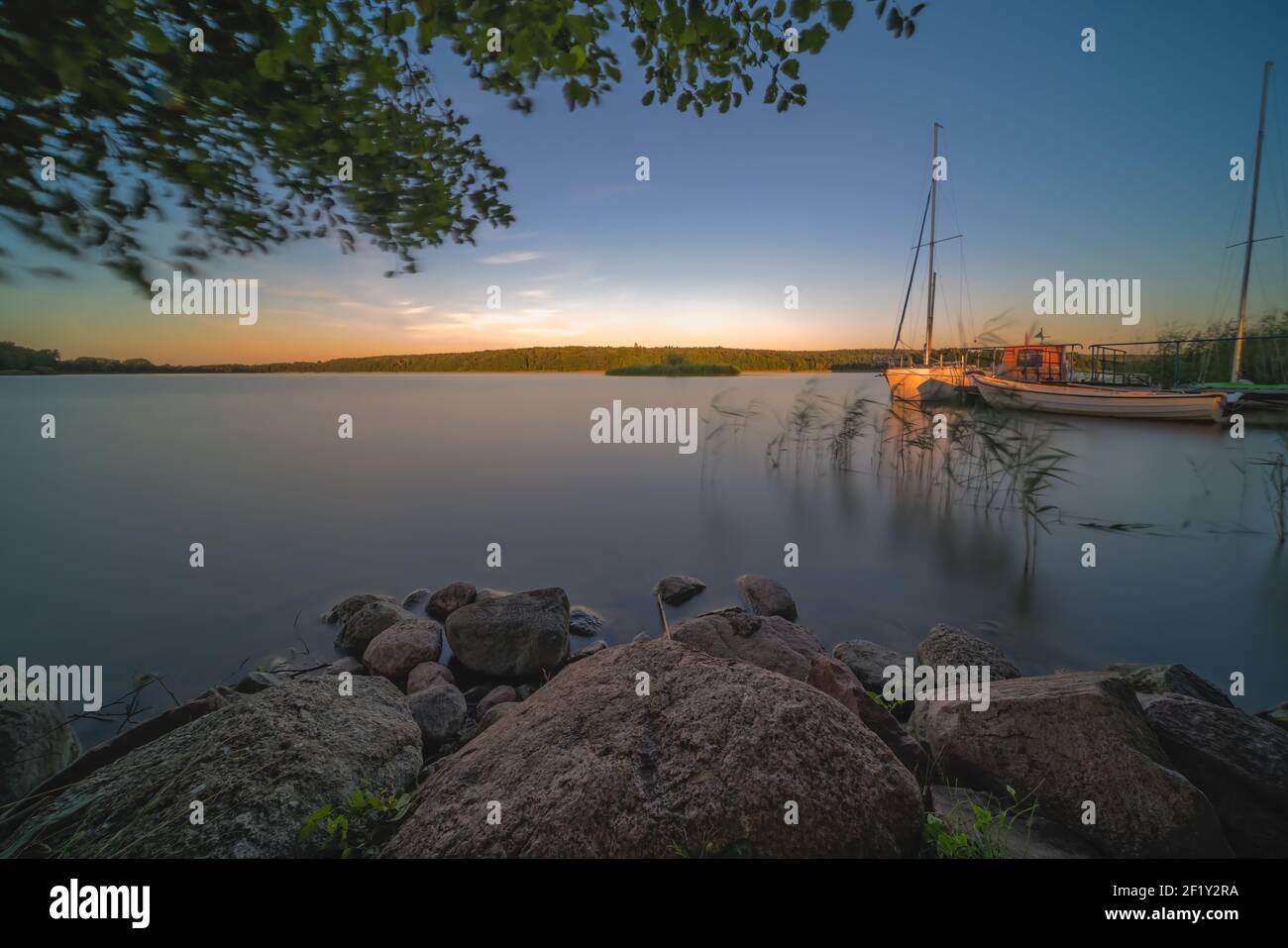 Boats on the Jezioro Ostrowieckie in summer Stock Photo