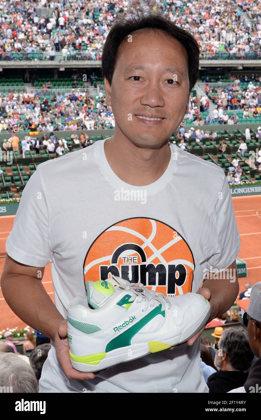 Michael Chang (USA) returns to Roland-Garros to celebrate the 25th  anniversary (1989) of his victory and shows the shoe with which he won,  during the French Tennis Open at the Roland Garros
