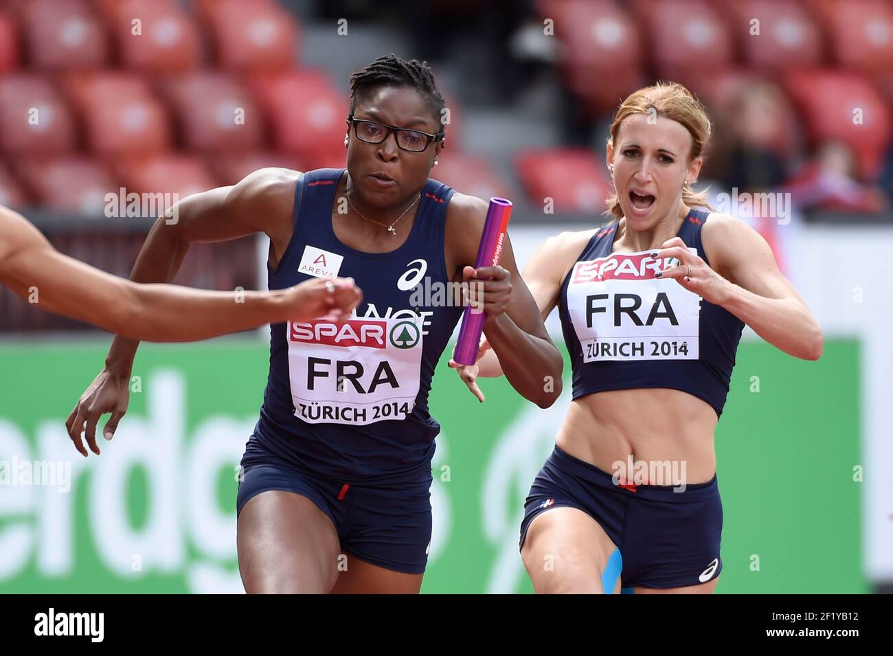 Ayodele Ikuesan (FRA) and Céline Distel-Bonnet (FRA) / 4X400m Relay during  the Day five of the European Athletics Championships 2014 at Letzigrund  Stadium in Zurich, Switzerland, on August 12-17, 2014. Photo Julien
