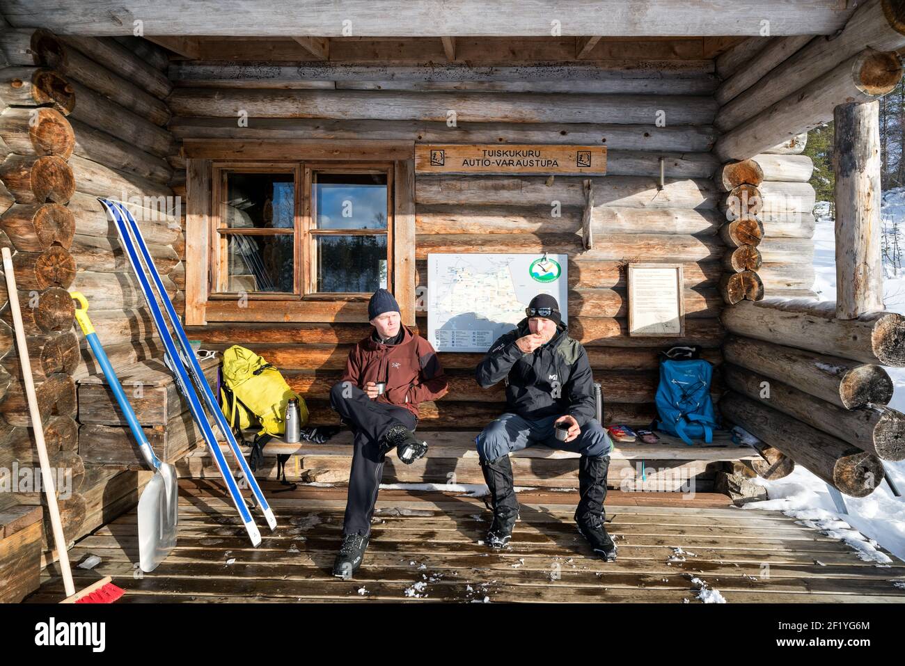 Having a break at Tuiskukuru open wilderness hut while ski touring in Urho Kekkonen National Park, Sodankylä, Lapland, Finland Stock Photo