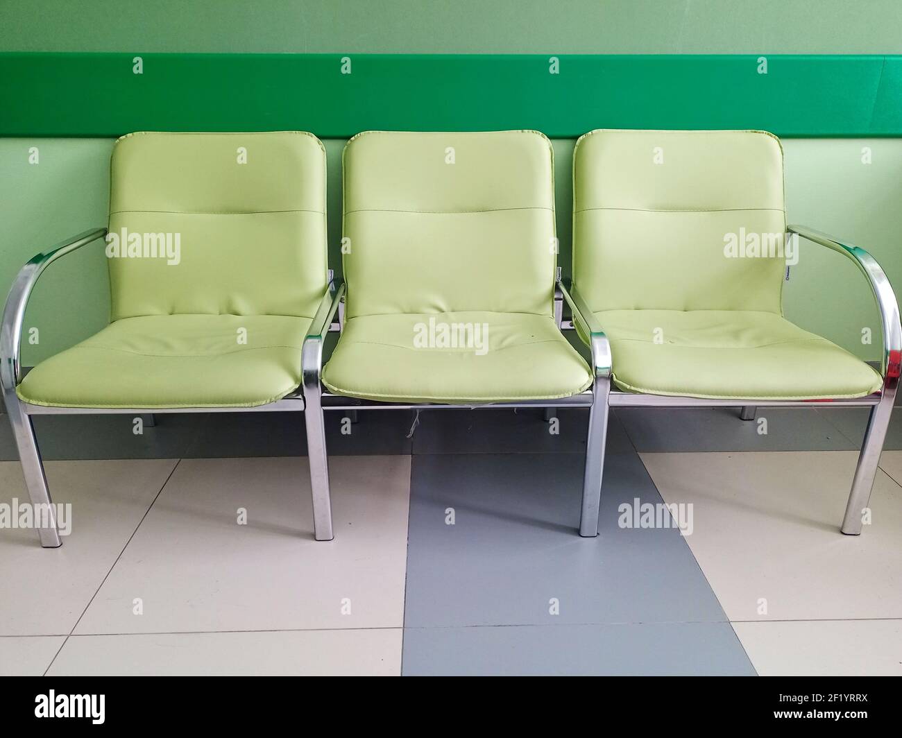 Chairs in the hallway for waiting . Empty chairs in the reception area. Stock Photo