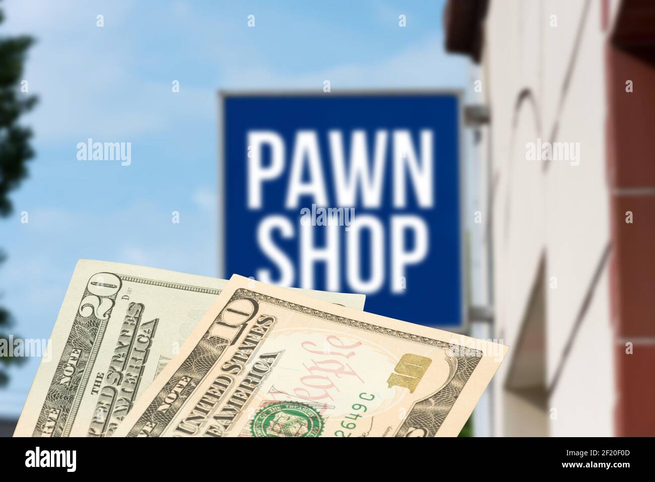 A pawnshop in America and dollar bills Stock Photo