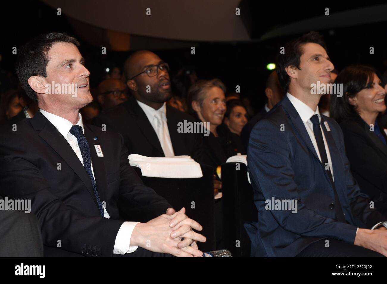 The french prime minister Emmanuel Valls, the judoka Teddy Riner, and