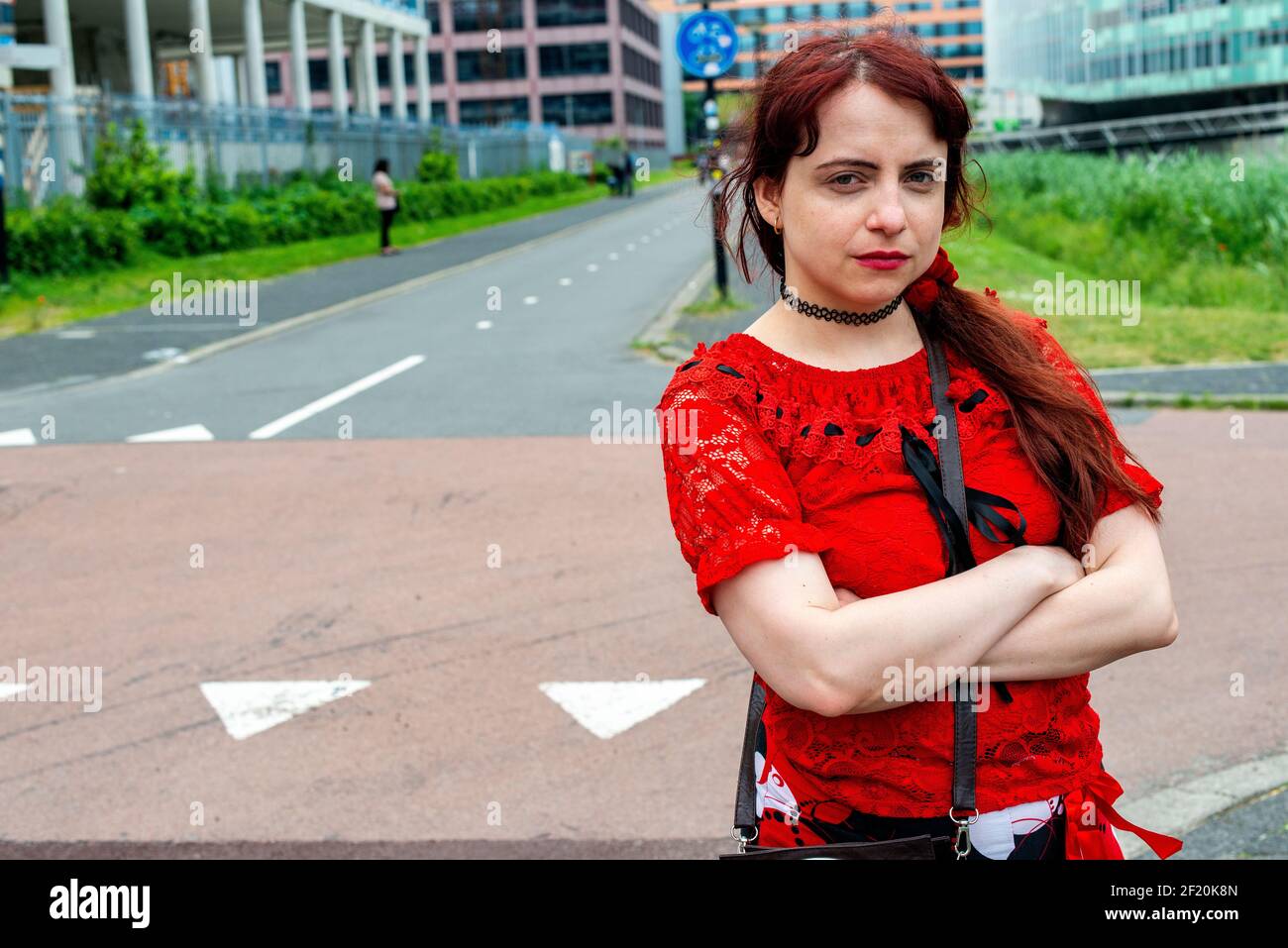 Amsterdam, Netherlands. Streetportrait of a young, redhaired woman. Stock Photo