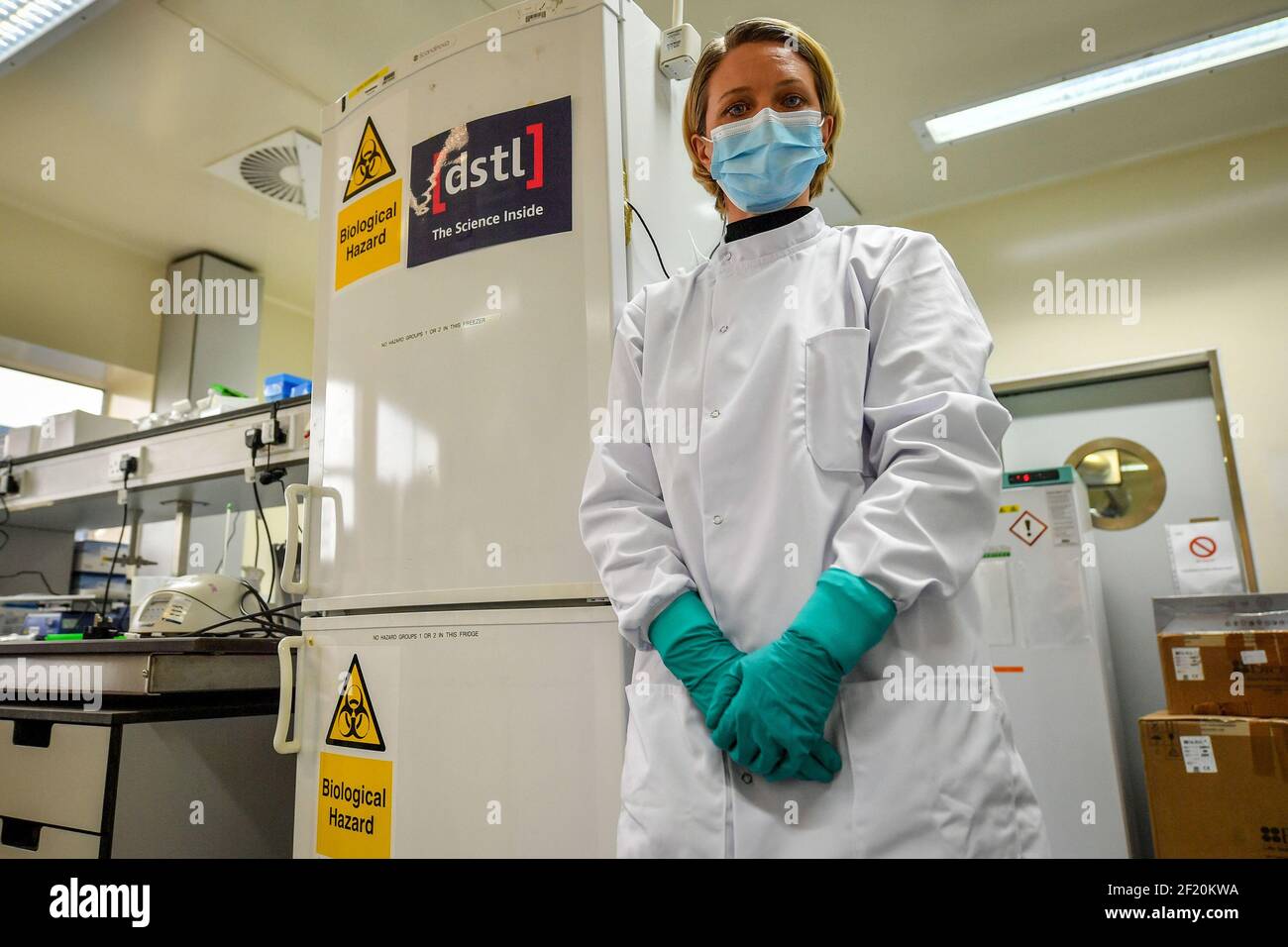 ONE USE ONLY NO ARCHIVE NOTE: IMAGE HAS BEEN PIXELLATED BY PA PICTURE DESK FOR SECURITY REASONS Previously unissued photo dated 25/2/2021 of virologist Amanda Phelps inside a lab at The Defence Science and Technology Laboratory (Dstl) at Porton Down, near Salisbury, Wiltshire. Scientists who handle some of the most deadly substances in the world have described the 'trepidation' they felt when starting to research coronavirus. Issue date: Wednesday March 10, 2021. Stock Photo