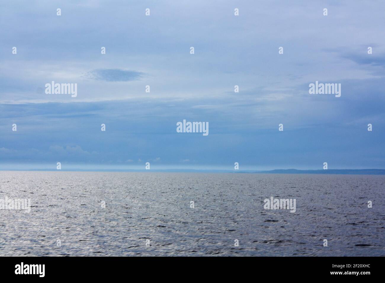 Blue sea or ocean water surface and underwater with sunny and cloudy ...