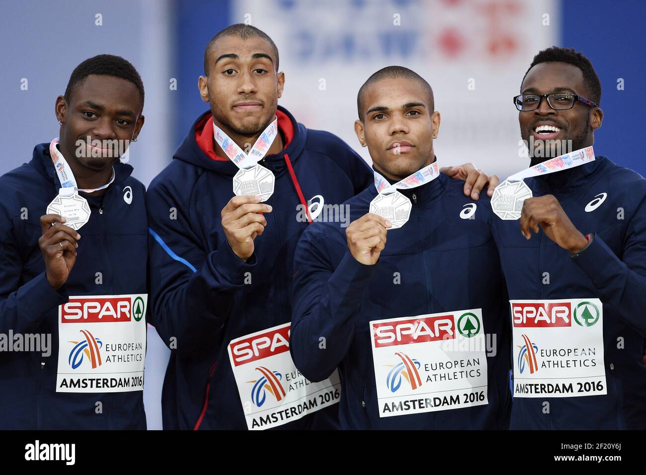 France's Marvin Rene, Jimmy Vicaut, Stuart Dutamby, Mickael Zeze pose with the silver medal on 4x400m relay podium during the Athletics European Championships 2016, in Amsterdam, Netherlands, day 5, on July 10, 2016 - Photo Philippe Millereau / KMSP / DPPI Stock Photo