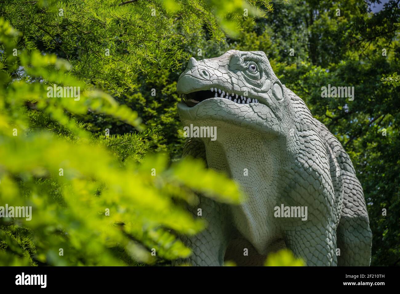 Dinosaur sculpture in a public park Stock Photo - Alamy