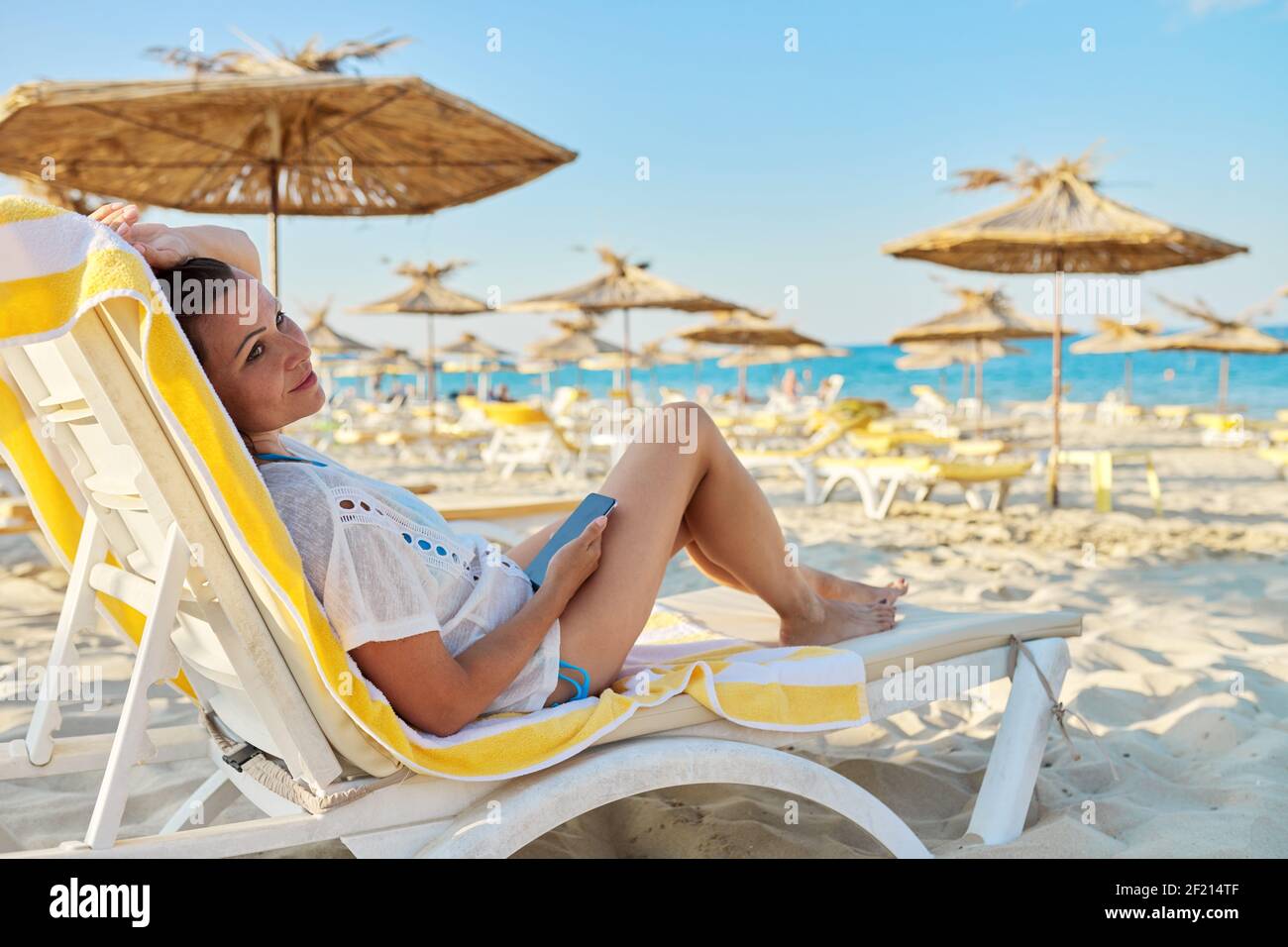 Relax sun lounger mature woman hi-res stock photography and images - Alamy