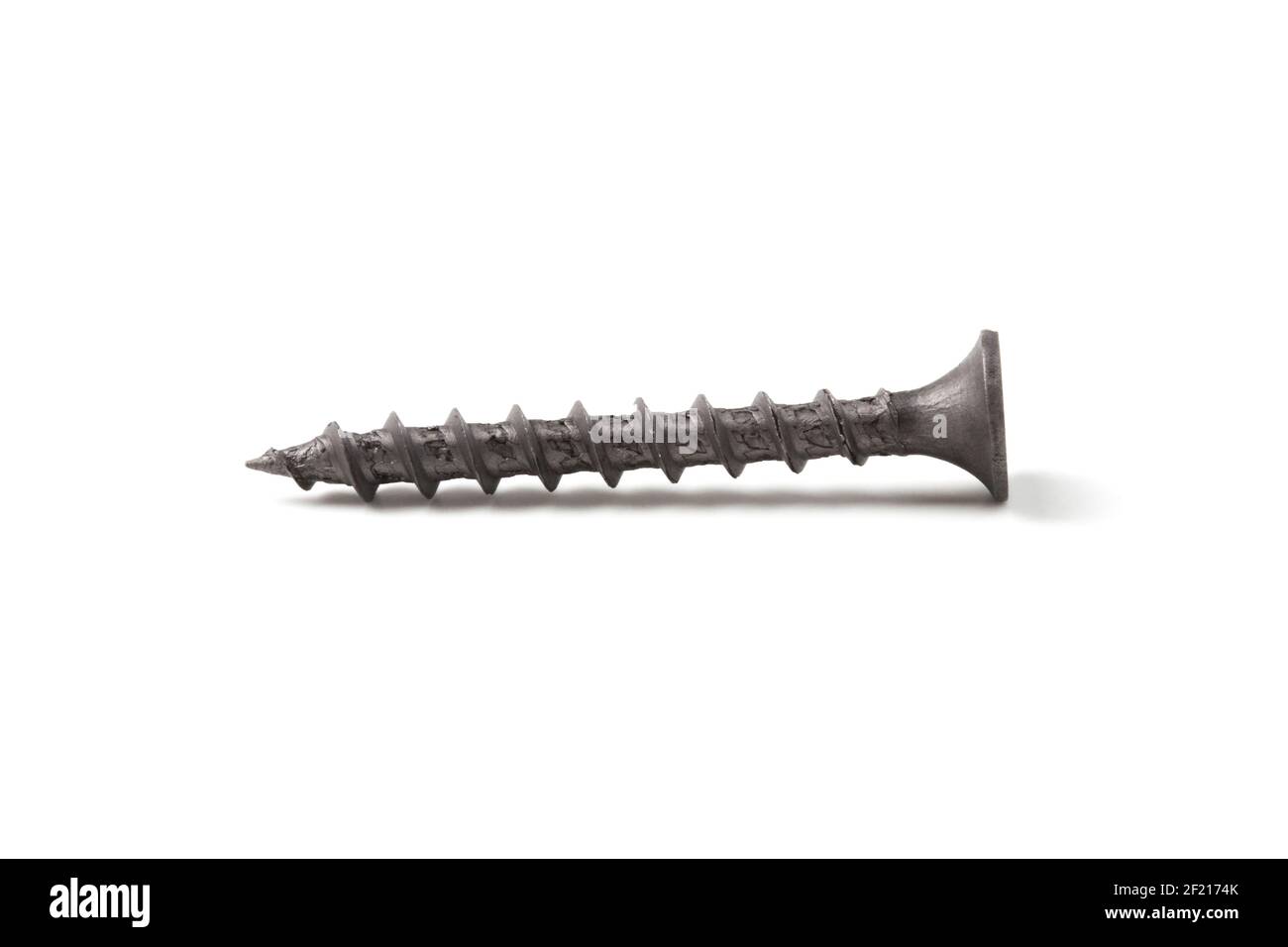 Black self-tapping screw for wood close up isolated on white background Stock Photo
