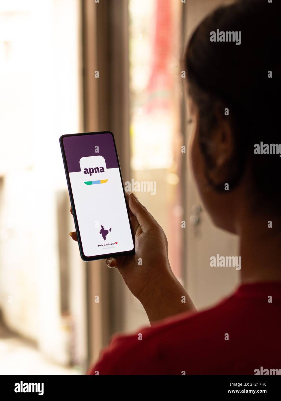 Assam, india - March 10, 2021 : Apna logo on phone screen stock image. Stock Photo