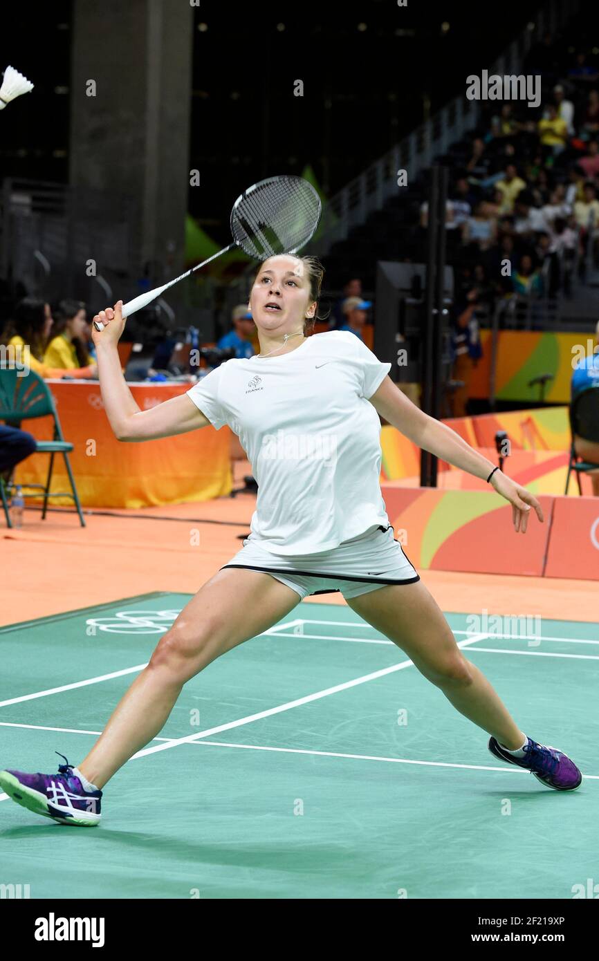 France's Delphine Lansac competes in Badminton Women's Single against Xiao  Yu Liang of Singapore during the