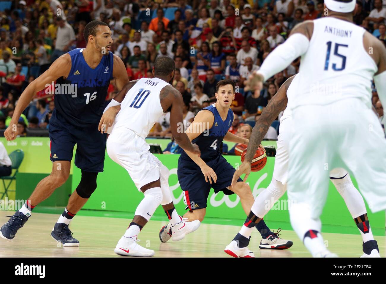 France s Thomas Heurtel and udy Gobert Basketball Men s in action against Kyire Irving (USA) during the Olympic Games RIO 2016, Basketball Men, USA v France, on August 14, 2016, in Rio, Brazil - Photo Eddy Lemaistre / KMSP / DPPI Stock Photo