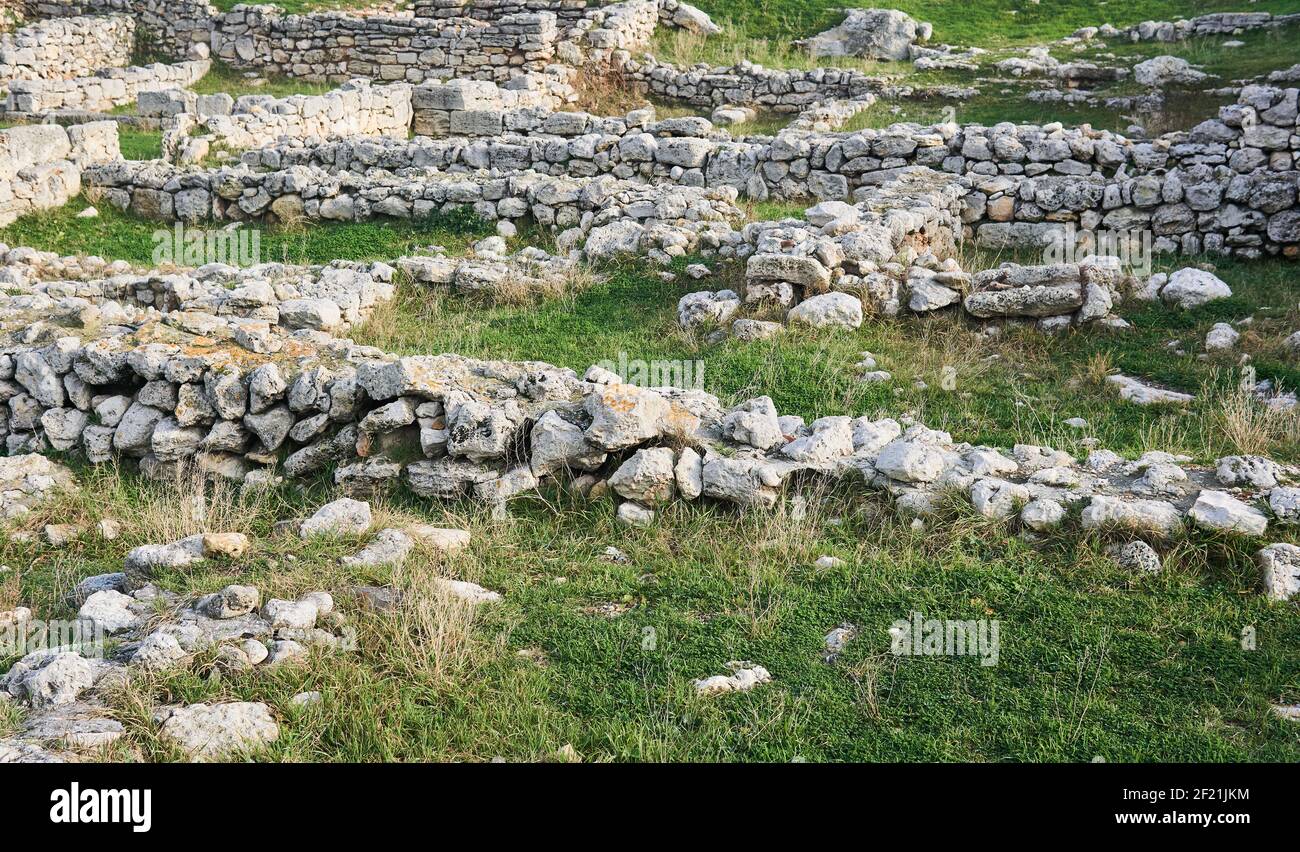 remains of walls and basements on the site of a destroyed ancient city Stock Photo
