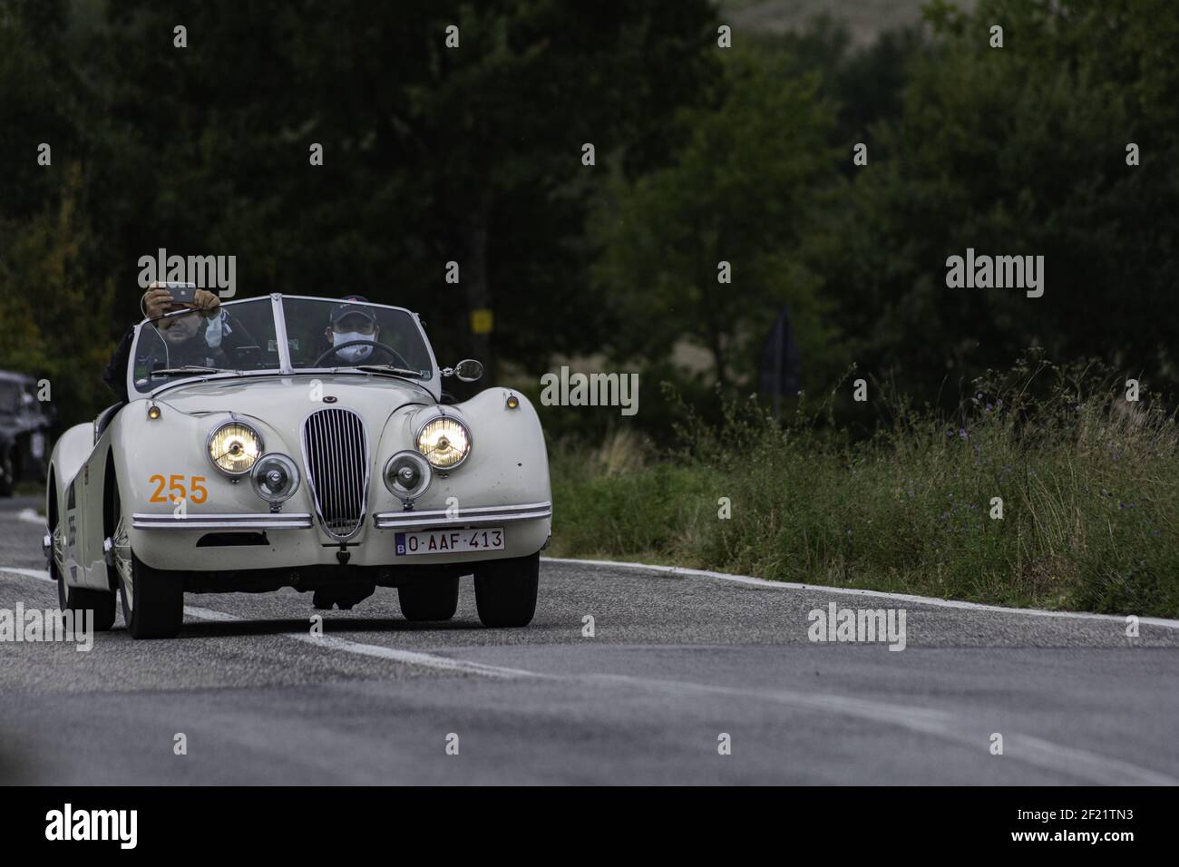 CAGLI, ITALY - Oct 22, 2020: CAGLI , ITALY - OTT 24 - 2020 : JAGUAR XK 120 SE OTS 1954 on an old racing car in rally Mille Miglia 2020 the famous ital Stock Photo