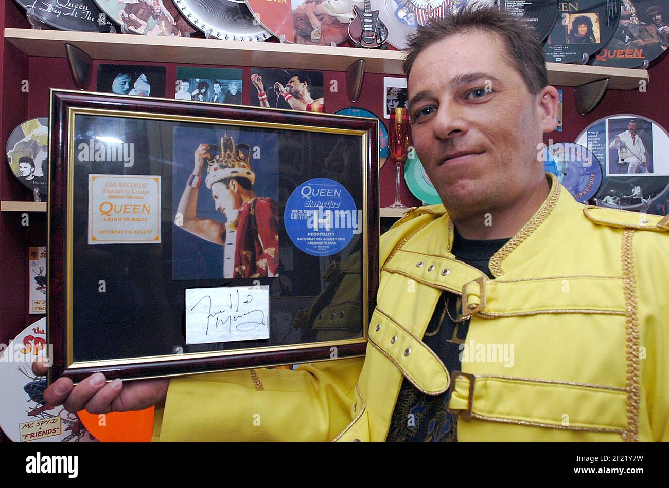 The no.1 fan of rock legends, Queen, Andy Sparks, with his prized Freddie  Mercury autograph,