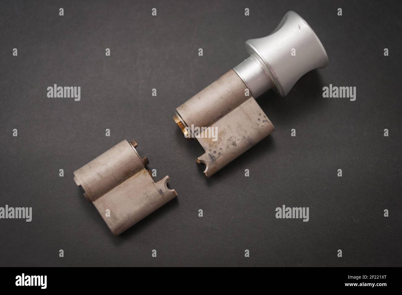 Lock cylinder with knob broken in the middle. Cylinder was pulled