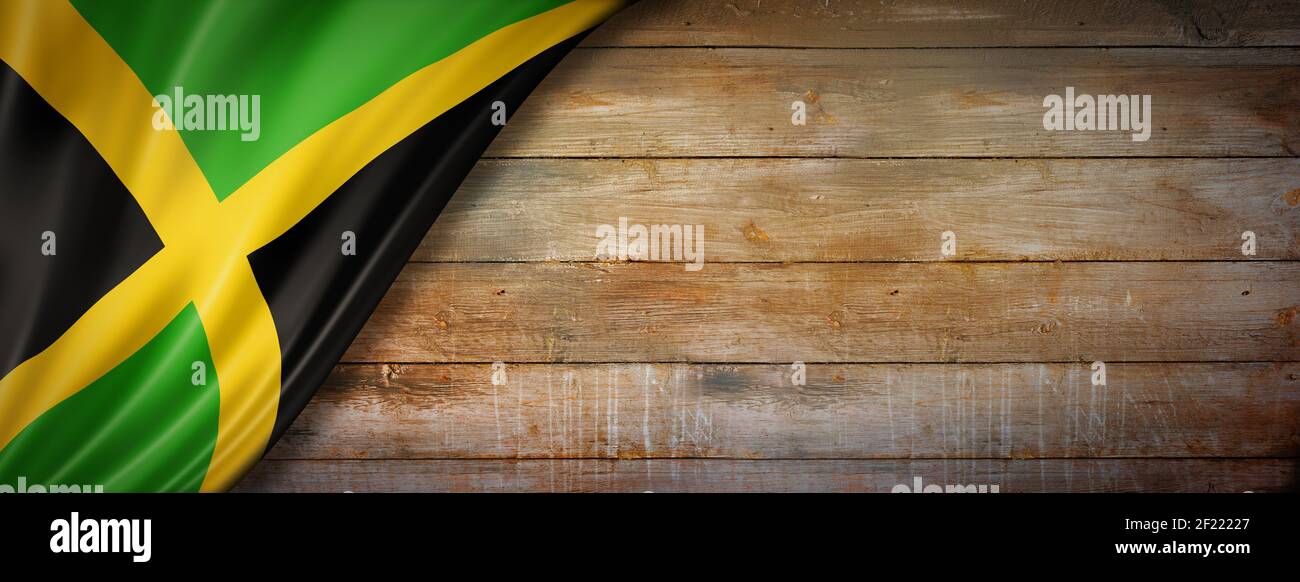 Jamaican flag on vintage wood wall banner Stock Photo