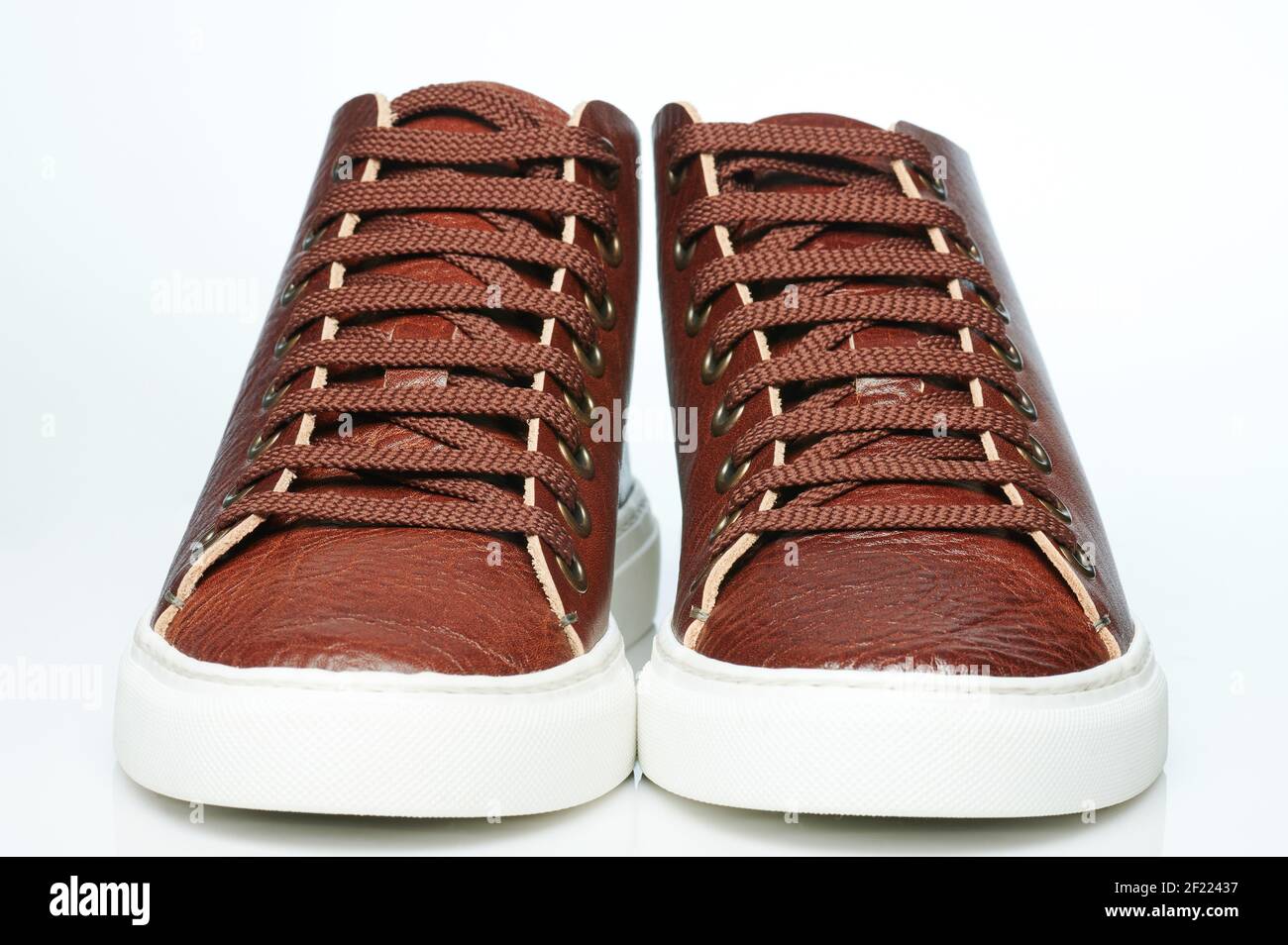 Front view of pair leather keds isolated on studio background Stock Photo