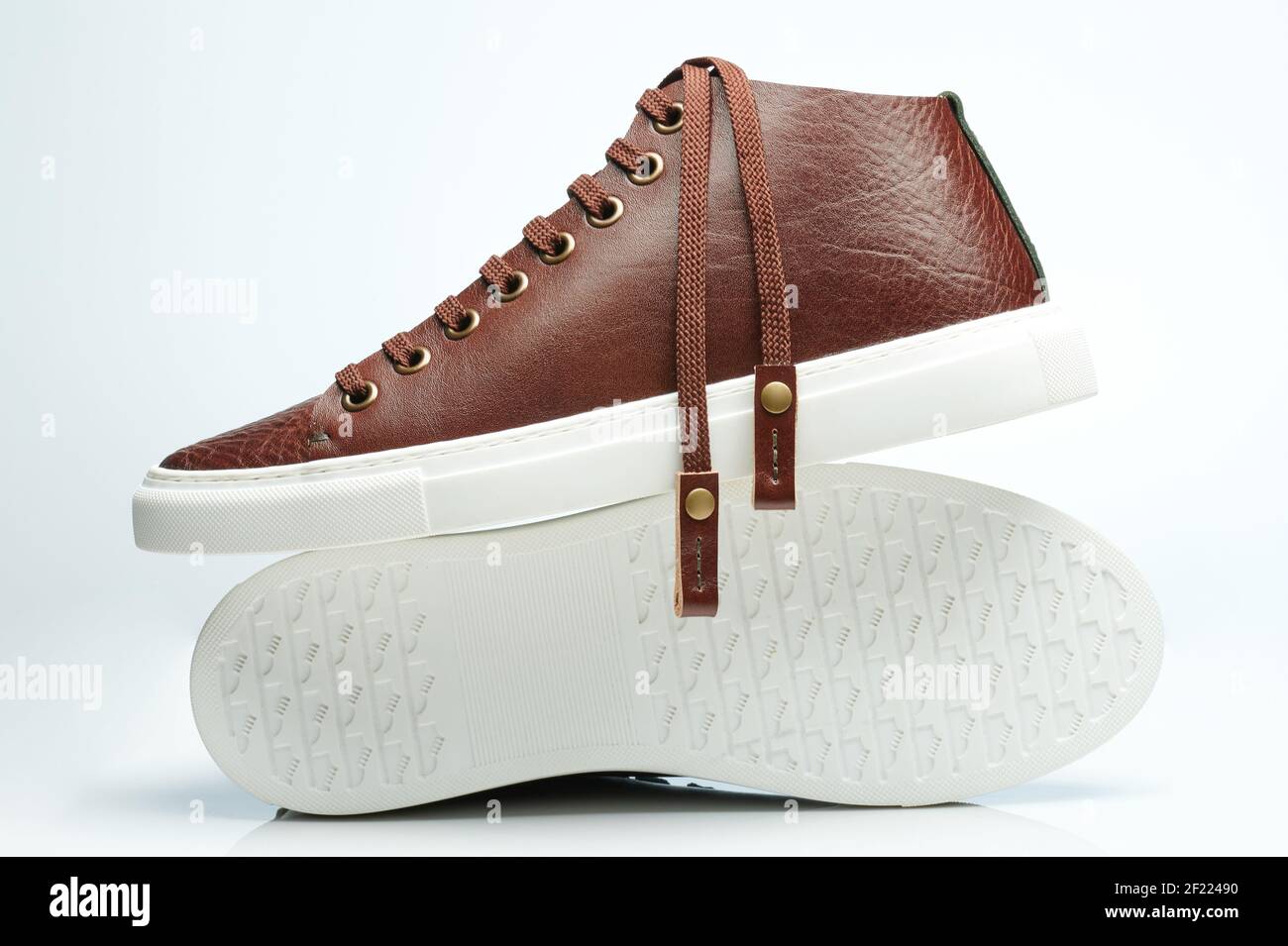 Brown leather casual pair shoes with laces isolated Stock Photo