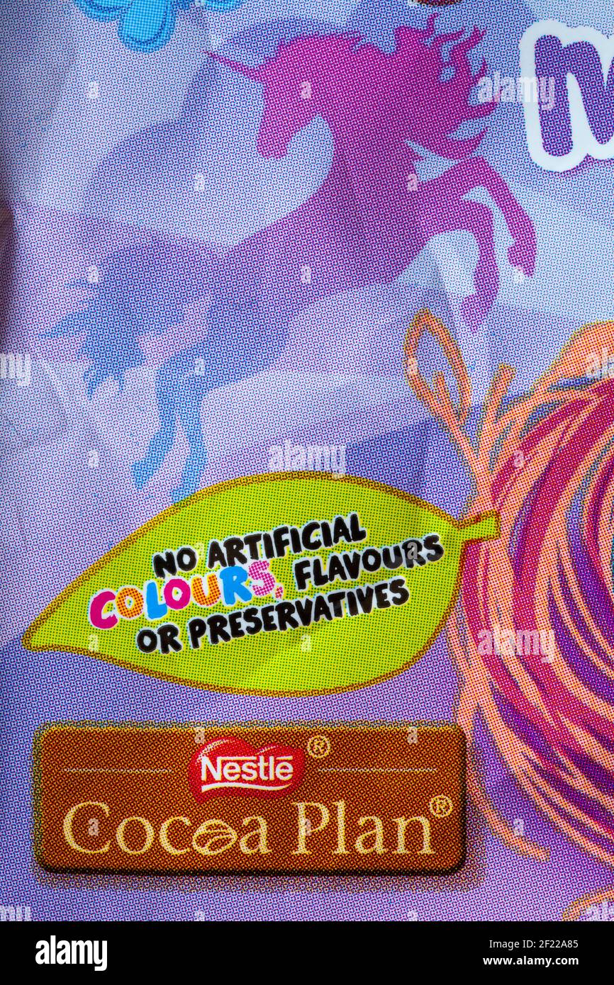 no artificial colours flavours or preservatives and Nestle Cocoa plan - detail on packet of Unicorn edition Smarties mini eggs from  Nestle Stock Photo