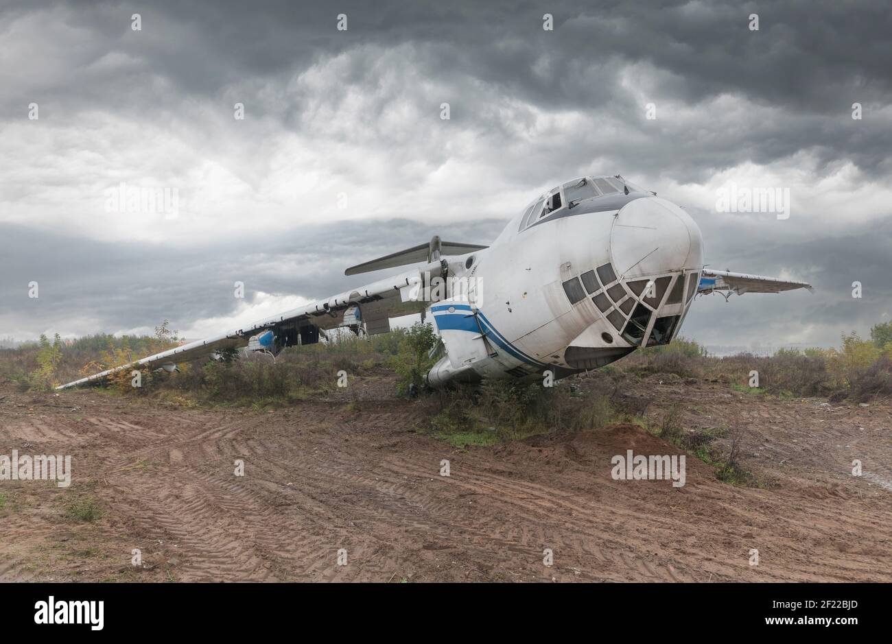 Old Soviet cargo plane IL-76 on the ground in cloudy weather. High quality photo Stock Photo