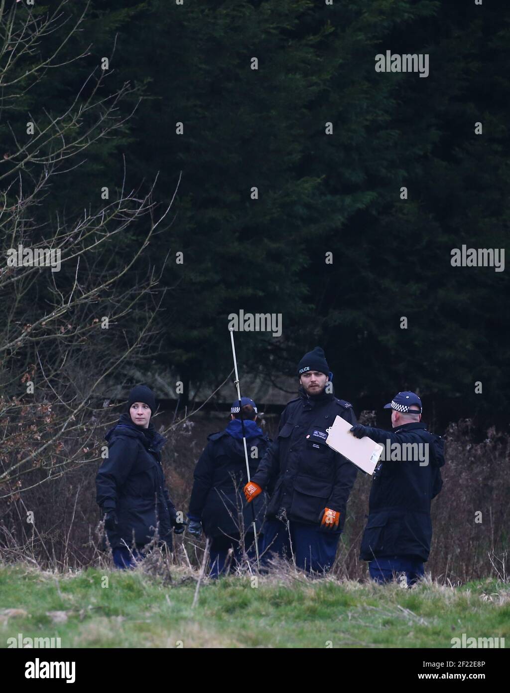 Officers from the Metropolitan Police search woodland near to Great Chart Golf and Lesiure in Ashford, Kent. A serving Metropolitan Police officer has been arrested in Deal, Kent, in connection with the disappearance of Sarah Everard who has been missing for a week. The 33-year-old disappeared on Wednesday March 3 after leaving a friend's house in Clapham, south London, and began walking to her home in Brixton. Picture date: Wednesday March 10, 2021. Stock Photo