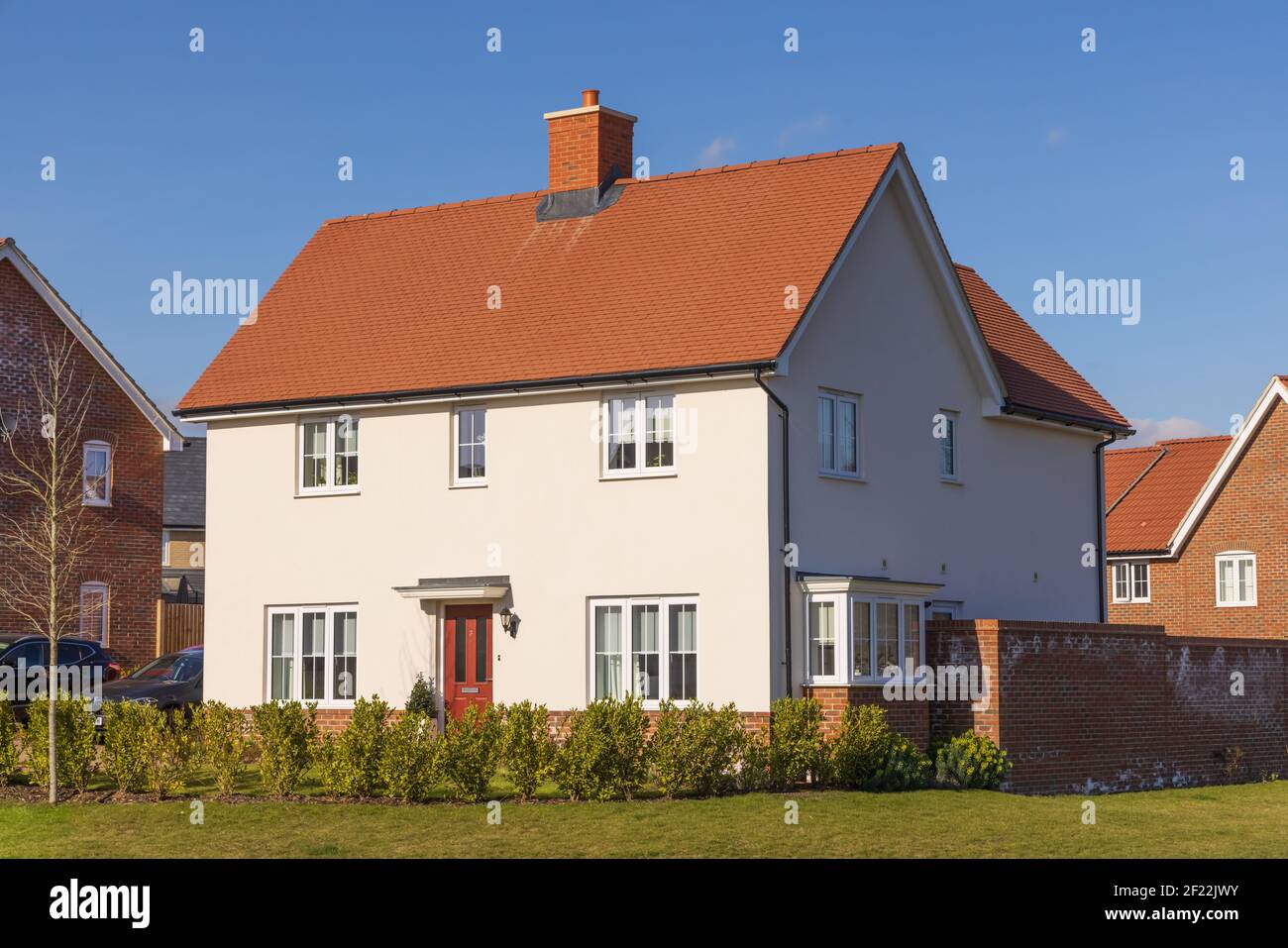 New build home with render in the new St Michael's Hurst housing