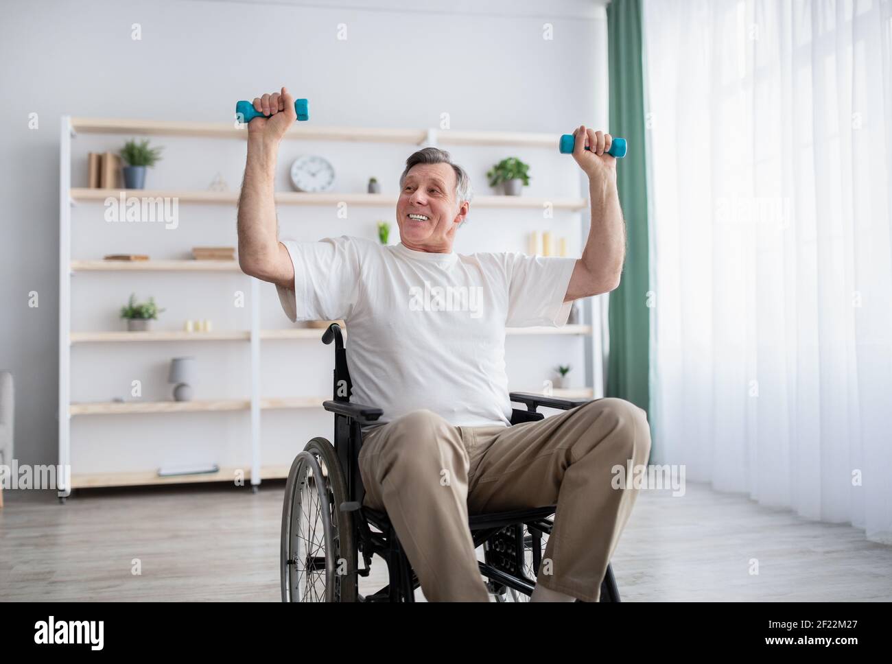 Physical activities for disabled elderly adults. Handicapped man in