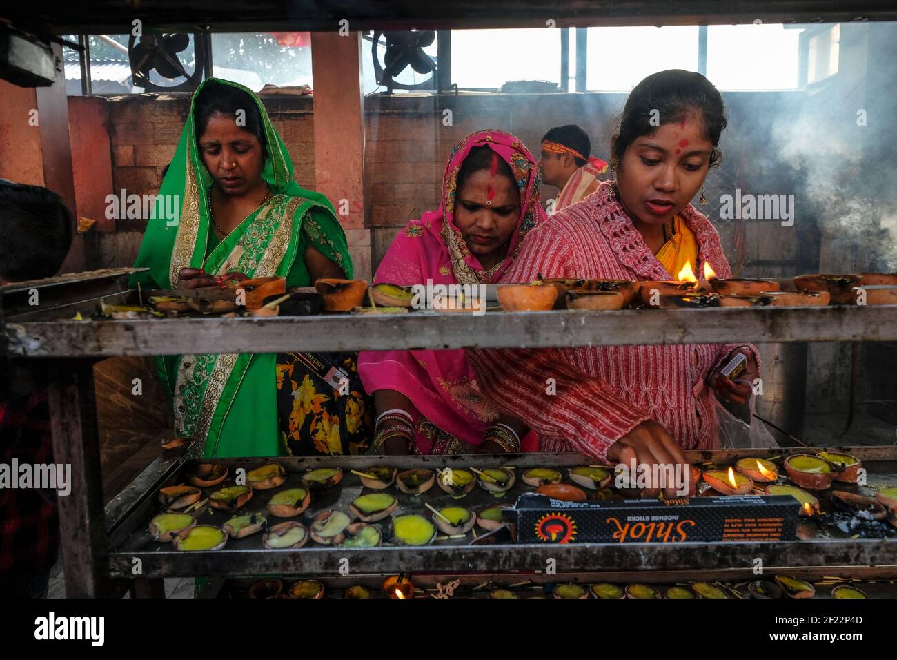 Guwahati, India - January 2021: A women making an offering at the Kamakhya Temple on January 18, 2021 in Guwahati, Assam, India. Stock Photo