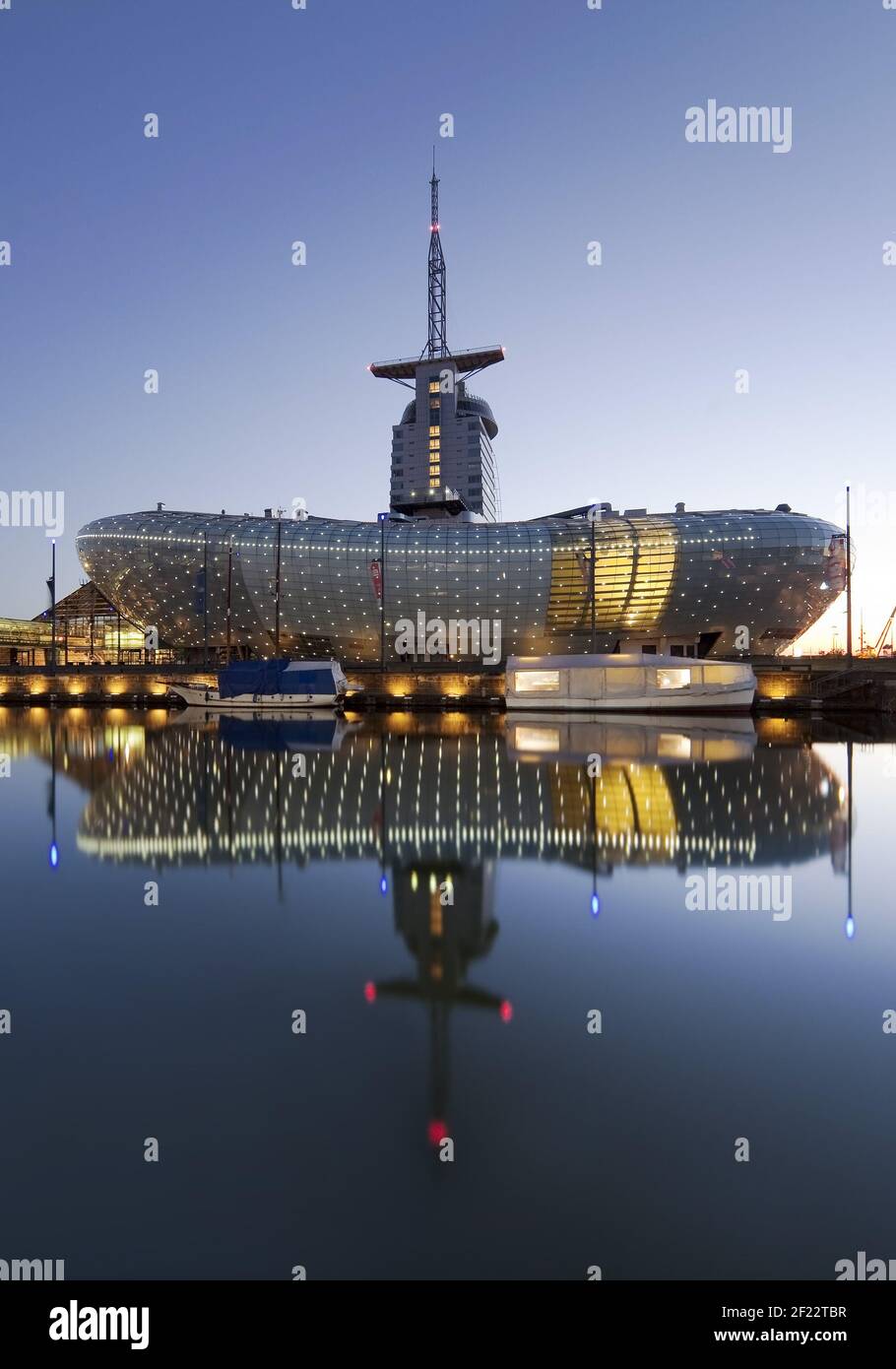 Illuminated climate house Bremerhaven in the evening, Havenwelten, Bremerhaven, Germany, Europe Stock Photo