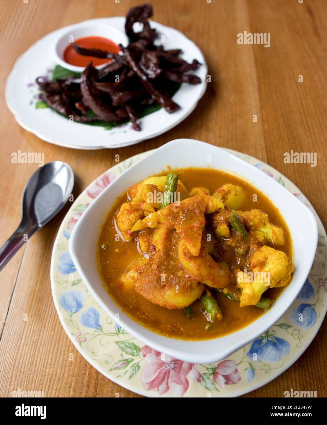101 Thai Kitchen Pic Shows:  Sour Prawn Curry with Salted Beef Side Stock Photo