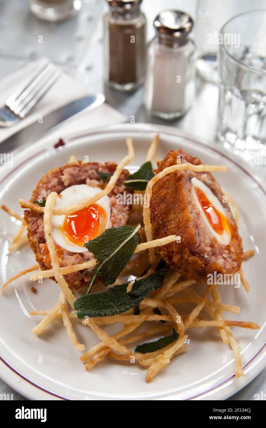 *For use in the Evening Standard only - charges may apply*  Ape & Bird, Central London Pic Shows:  Pigs Trotter Scotch Egg & Celeriac Fries Stock Photo