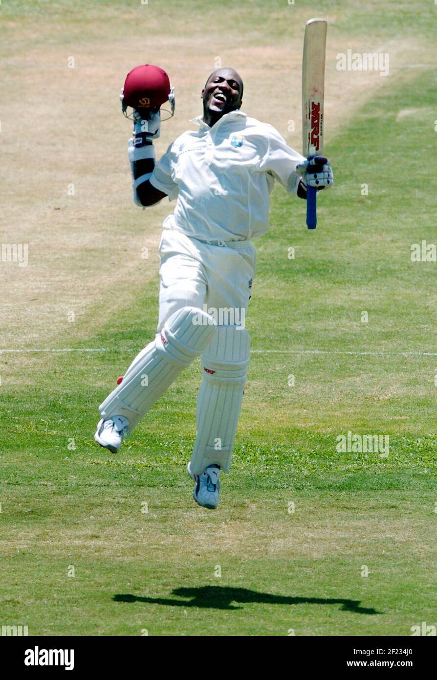 "Brian Lara celebrates after scoring an unbeaten 400 runs against England at the Antigua Recreation Ground in April 2004."