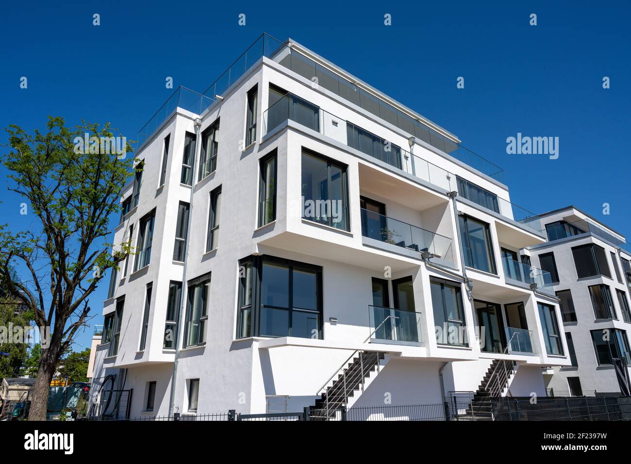Modern white townhouses seen in Berlin, Germany Stock Photo
