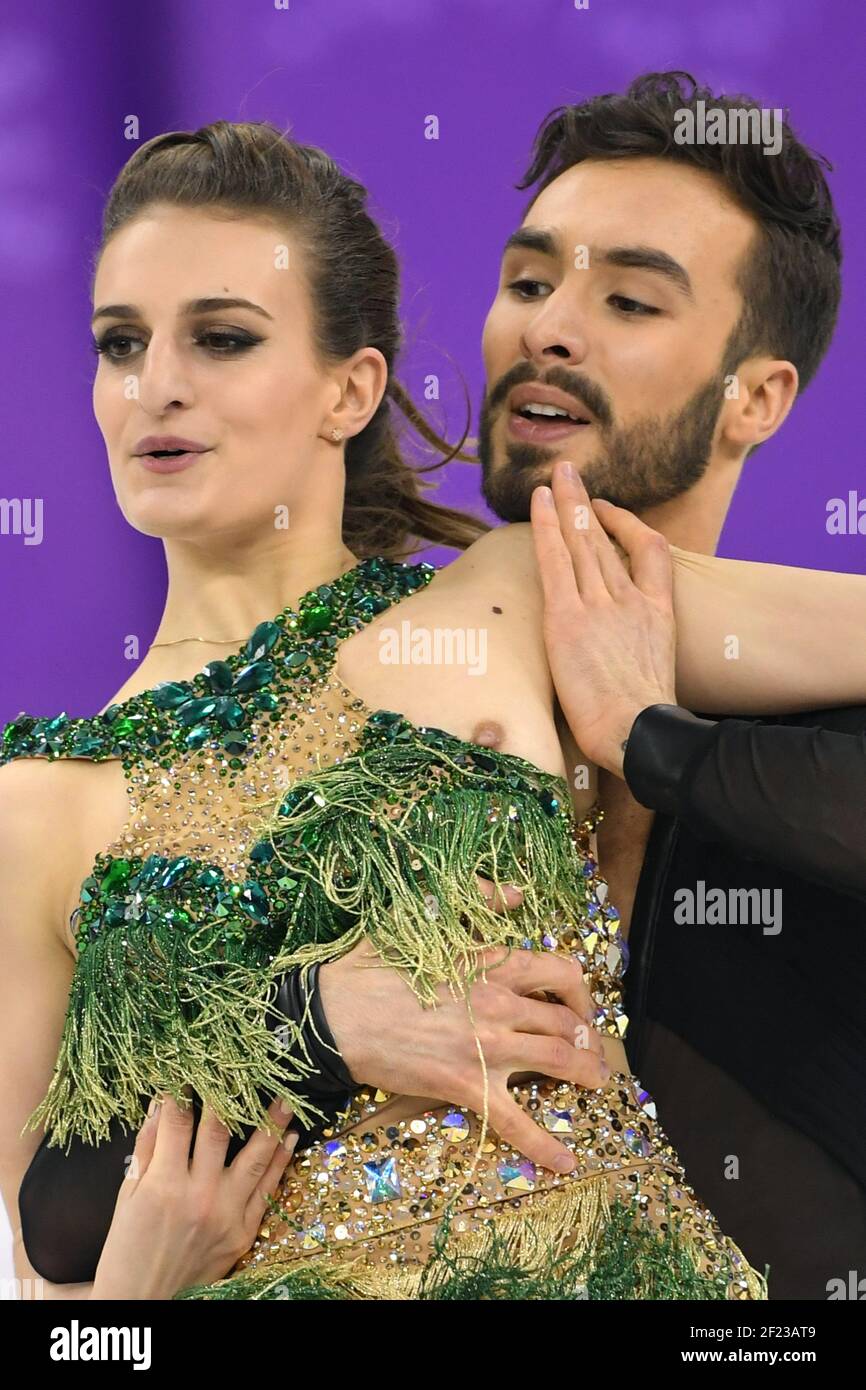 Gabriella Papadakis (Her dress is undone and reveals her bosom) and  Guillaume Cizeron during the XXIII Winter Olympic Games Pyeongchang 2018,  Figure Skating, Ice Dance Short program, on February 19, 2018, at