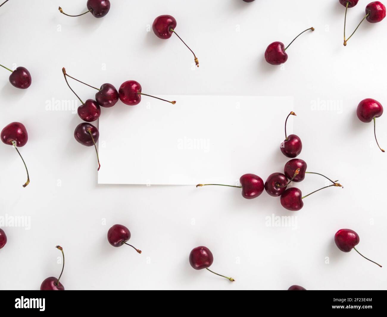 Cherry isolated on white with white rectangle Stock Photo