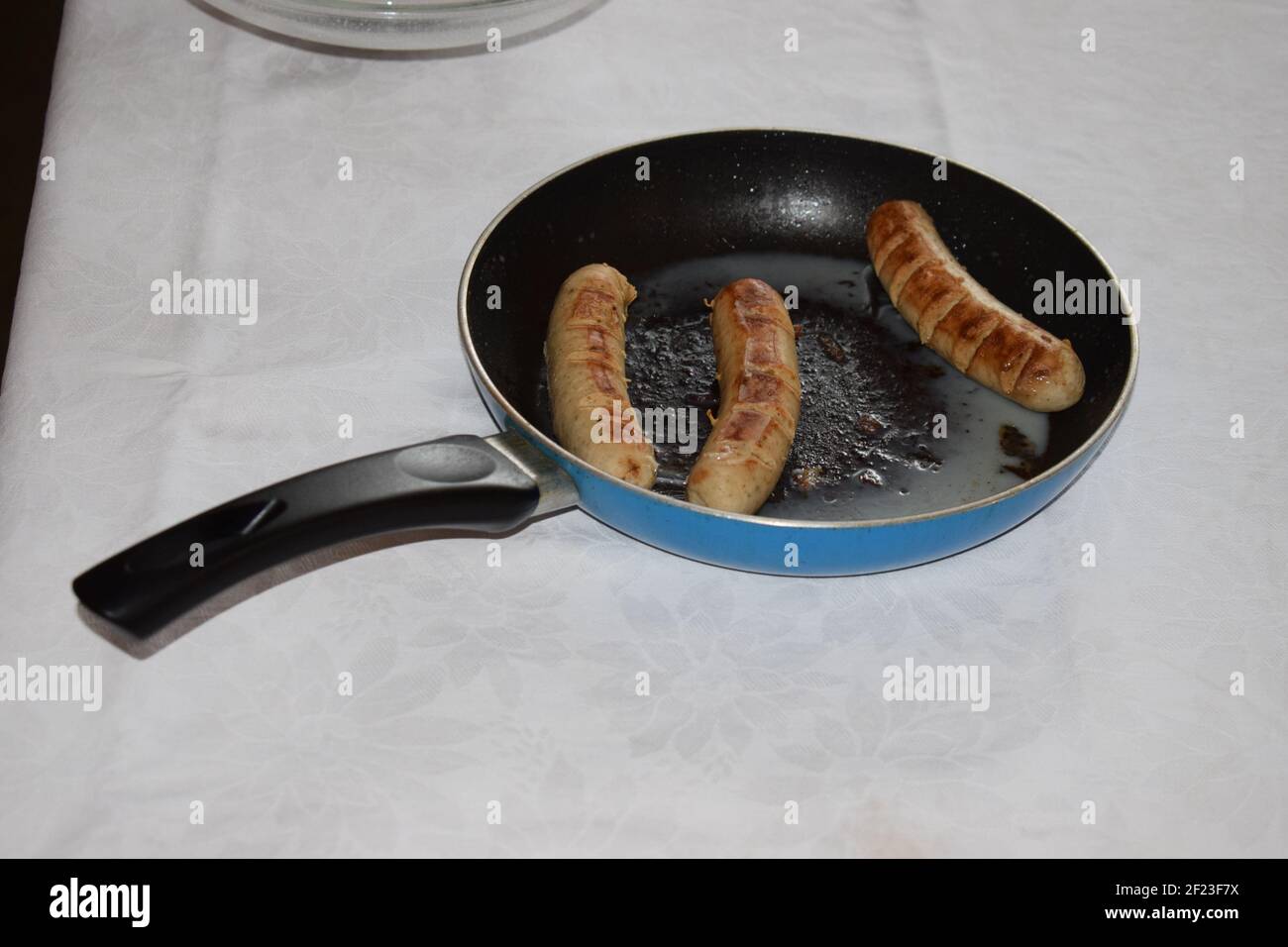 sausages in a pan Stock Photo