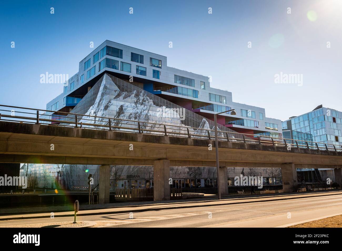 Mountain Dwellings (Danish: Bjerget) is a building in the Ørestad district of Copenhagen, Denmark, consisting of apartments above a multi-story car pa Stock Photo