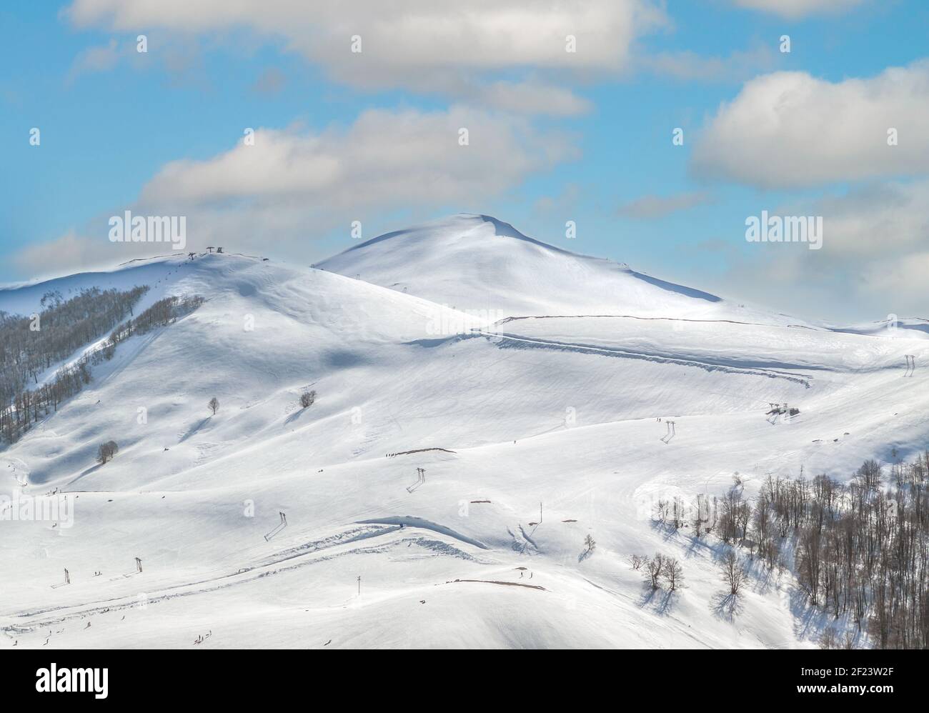 Campo Staffi and Mount Cotento (Italy) - The snow capped mountains with forest in the province of Frosinone, Lazio region, in Simbruini mounts. Stock Photo